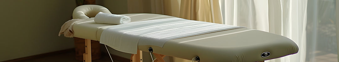 Covers for face cradles and headrests for client comfort during relaxing massage treatments.
