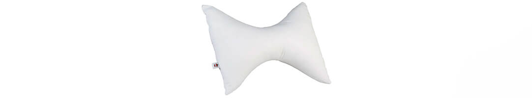 Bowtie style cervical support pillow for neck and shoulder support