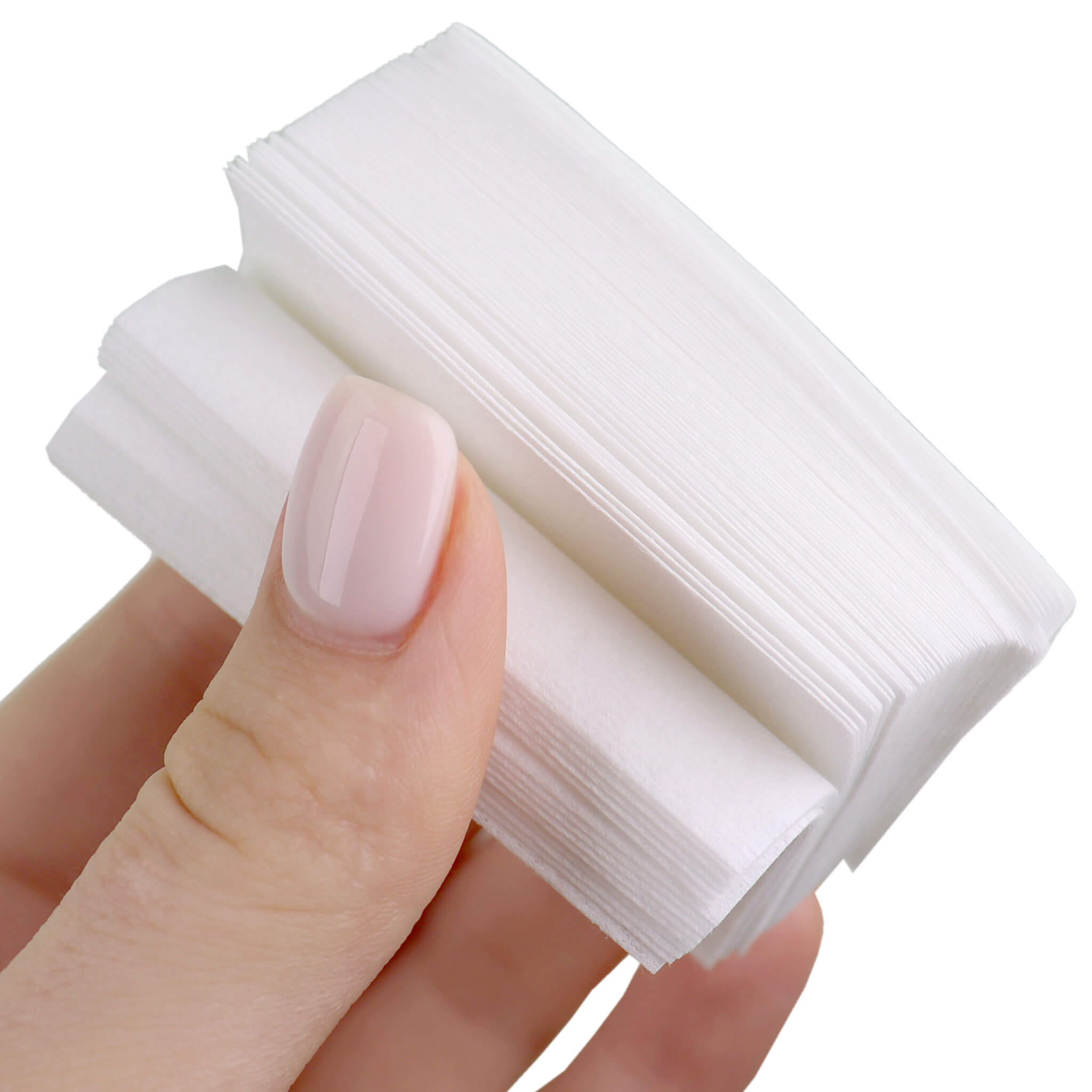 Nail Polish Remover Pads being held between models fingers