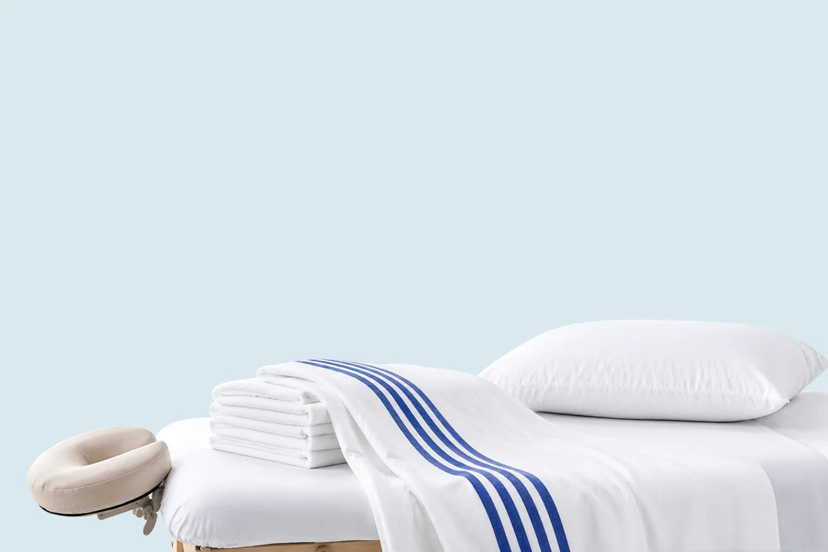 Clinical linens mobile banner featuring premium linen products arranged on a soft neutral background with a minimal aesthetic and spacious layoutlayout