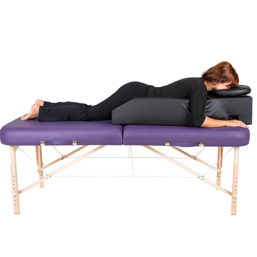 Client using Earthlite Pregnancy Bolster full support black from WR Linens